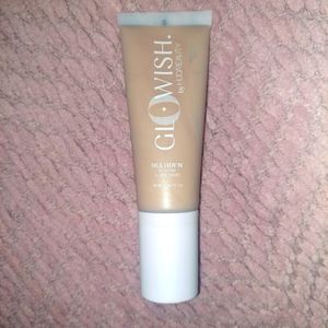 Huda Beauty glowish multidew skin tint foundation in 04 light medium